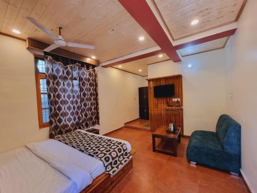 Postel nebo postele na pokoji v ubytování Hotel Twilight Dalhousie