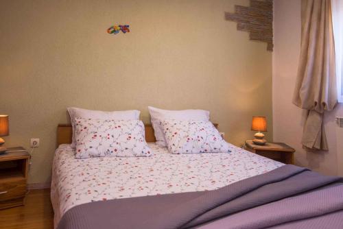 Posteľ alebo postele v izbe v ubytovaní Apartment in Veli Losinj 33734
