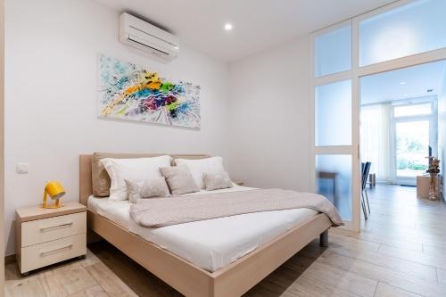 Ένα ή περισσότερα κρεβάτια σε δωμάτιο στο Villa Kogo