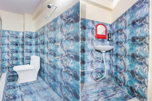 Un baño de Hotel O SHRI DURGA HOTEL