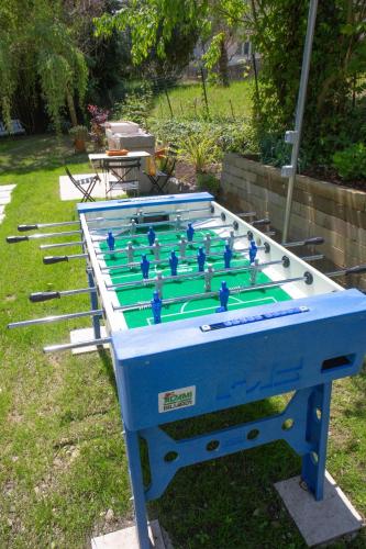 a blue foosball table with at Susy's Apartment in Pastrengo