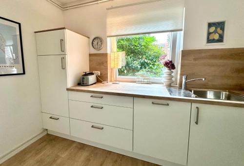 Η κουζίνα ή μικρή κουζίνα στο 1015 - Haus Tuskulum