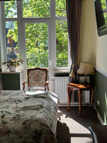 Llit o llits en una habitació de Tuberoza