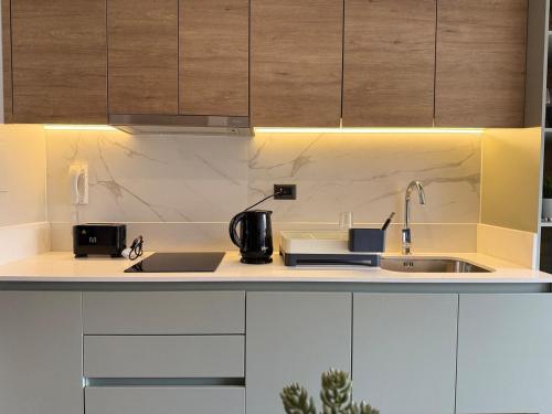 Η κουζίνα ή μικρή κουζίνα στο Acogedor departamento en Ñuñoa