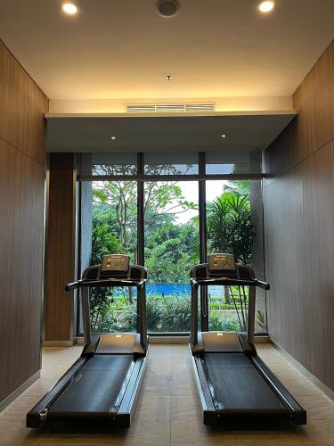 Gambar di galeri bagi Cozy Fully Furnished 2BR Apartment NavaPark BSD di Cilenggang