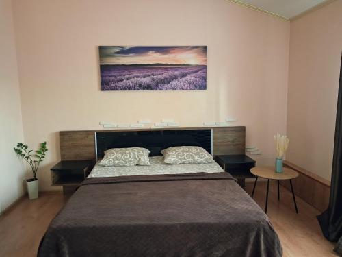 Postel nebo postele na pokoji v ubytování Studio apartments in center NEW 5 floor Без ліфту