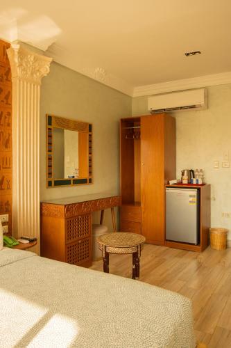 Cuisine ou kitchenette dans l'établissement Jimmy Pyramids Hotel