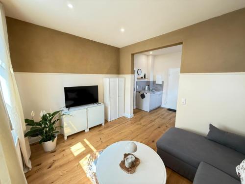 a living room with a couch and a table at Matilda in Ahrensbök