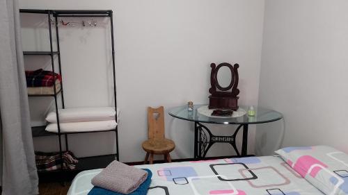 Katil atau katil-katil dalam bilik di Apartamento Tita