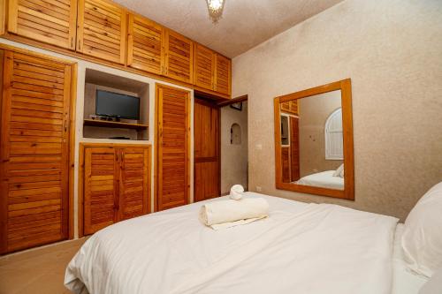Ένα ή περισσότερα κρεβάτια σε δωμάτιο στο Chalet berbère 5 Chambres avec Piscine &Wifi fibre