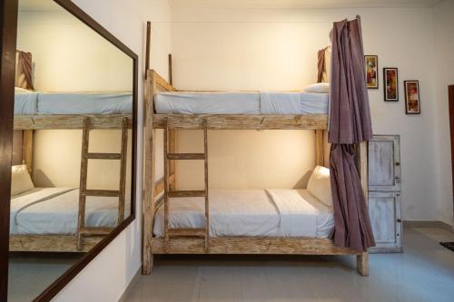 Postel nebo postele na pokoji v ubytování Seva Hotel