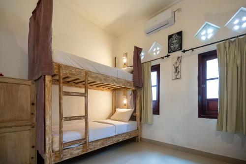 Postel nebo postele na pokoji v ubytování Seva Hotel