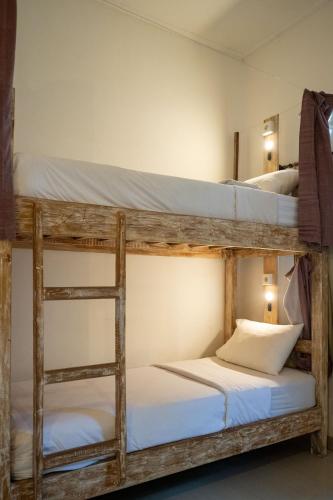 Postel nebo postele na pokoji v ubytování Seva Hotel