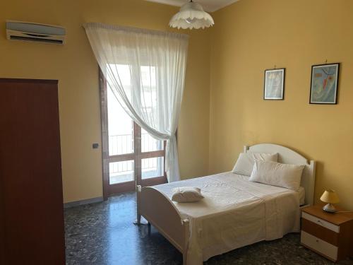 Postel nebo postele na pokoji v ubytování CasAnna nel cuore del Salento Arnesano LE