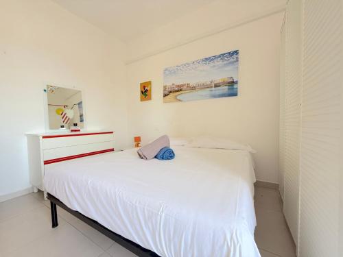 Ένα ή περισσότερα κρεβάτια σε δωμάτιο στο Maracaibo - Baia Verde