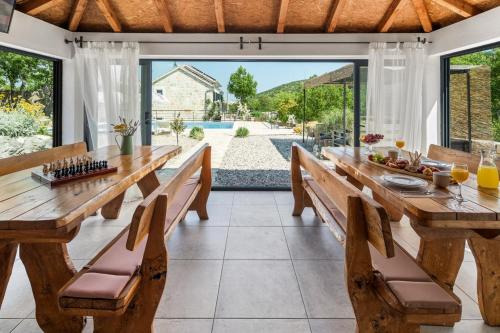 Villa Lugareva with 52 sqm private pool, 4 bedrooms, 4 bathrooms, summer kitchen, traditional environment, playground