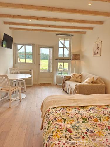 Postel nebo postele na pokoji v ubytování BnB Nest & Weide