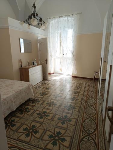 Кровать или кровати в номере Il Rifugio nel Centro