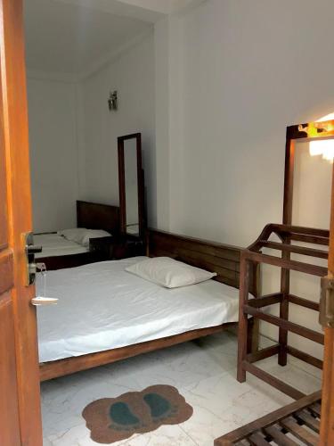 Una cama o camas en una habitación de Una Pandura Langa - UPL31ST