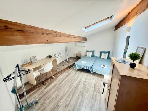 Postel nebo postele na pokoji v ubytování Ô'Berge & Chambres Avignon