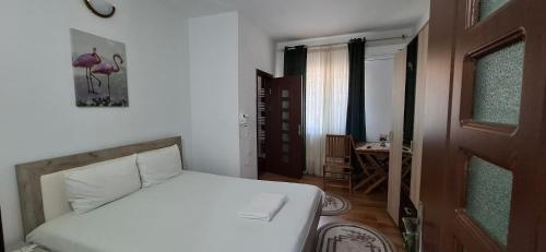Postel nebo postele na pokoji v ubytování Cazare la mare vila Constanta