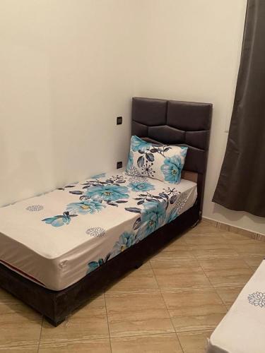 Ένα ή περισσότερα κρεβάτια σε δωμάτιο στο Appartement Yasmine à Martil