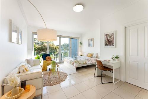 a living room with a couch and a table at Fantastic stay-walk to darling harbour&fish market in Sydney