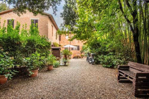 Un jardín fuera de Appartamento Vecchio Mulino