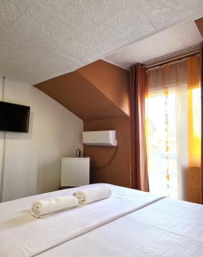 Casa Costa tesisinde bir odada yatak veya yataklar