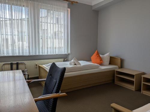 Postel nebo postele na pokoji v ubytování Hotel Walzwerk