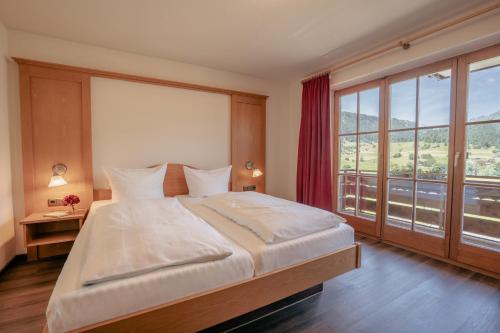 Hotel garni Oberdorfer Stubenにあるベッド
