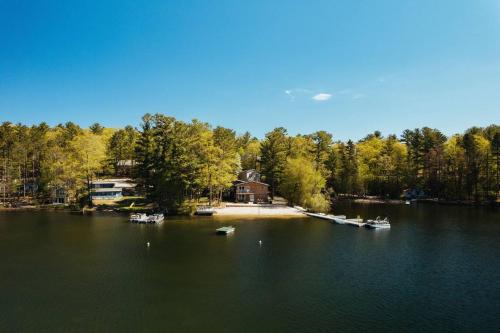 a view of a lake with boats in the water at TC Lake Stay-Pontoon & SUP Rentals - Sleeps 4! in Traverse City