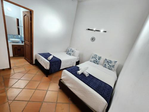 Een bed of bedden in een kamer bij Apartamento de la Villa II