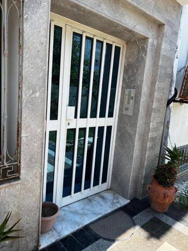 Η πρόσοψη ή η είσοδος του Appartement 2 chambres à 250m de la plage Monastir