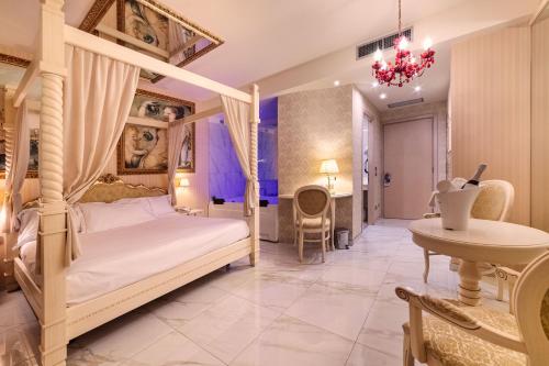 Postel nebo postele na pokoji v ubytování Motel Hotel Piranha