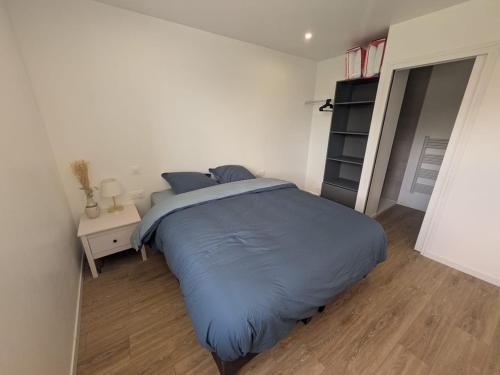 Postel nebo postele na pokoji v ubytování Gîte du Grand Donnay
