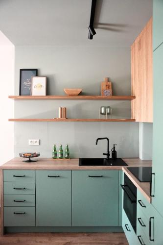 Η κουζίνα ή μικρή κουζίνα στο Apartamenty STUDIO R