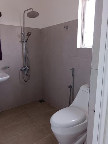 Ένα μπάνιο στο Oleesha Hotel - Negombo