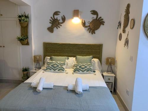 Postel nebo postele na pokoji v ubytování Apartamentos Strand Jávea
