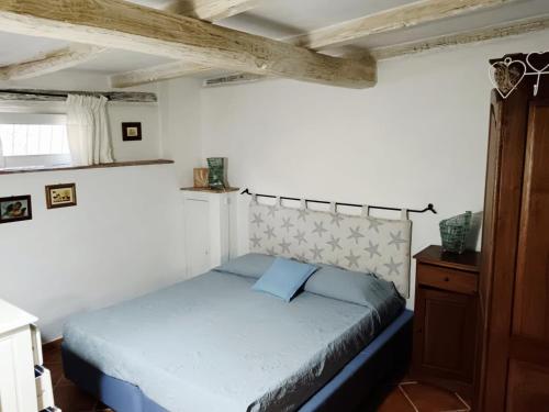 Ένα ή περισσότερα κρεβάτια σε δωμάτιο στο Incantevole Villa fronte mare a Palau
