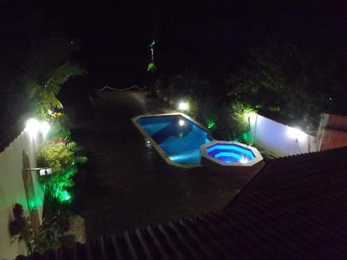 Der Swimmingpool an oder in der Nähe von Casa na Barra do Una, à beira do Rio Una e frente a Praia