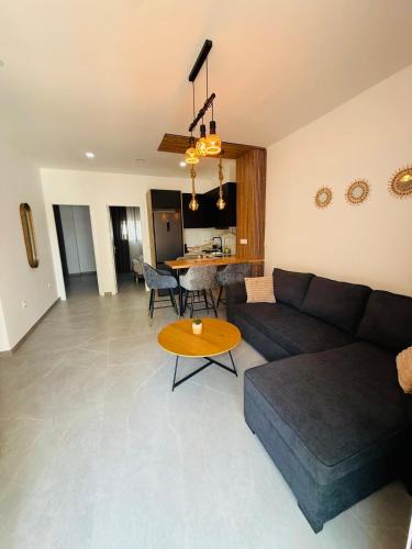 Posezení v ubytování Calpe apartamento LUXURY 2 min playa aparcamiento patio piscina aire wifi