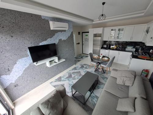 Η κουζίνα ή μικρή κουζίνα στο Neridabeahhomes 4
