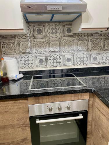 Dapur atau dapur kecil di Superbe Appartement Colina Smir, vue Piscine, bord de mer, plage de Kabila