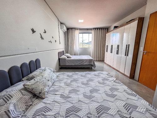 Casa espaçosa com 3 quartos | Até 11 pessoasにあるベッド