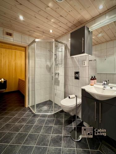 Bilik mandi di Ski-In Out apt Hafjell - Sauna and Stunning Views