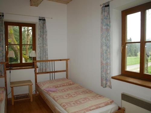 Postel nebo postele na pokoji v ubytování Chata Pod Koberštejnem