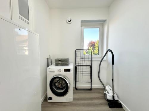 ヘンシュテット・ウルツブルクにあるHarmony Homes - Nähe Bahnhof - Terasse - Smart-TV - Nähe Hamburg & Flughafenのギャラリーの写真