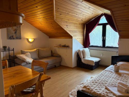 Кровать или кровати в номере Alpine Sun apartment