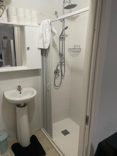 a bathroom with a shower and a sink at Ale&Anda2 in Trani
